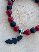 Load image into Gallery viewer, Red and Black Bat Stretch Bracelet
