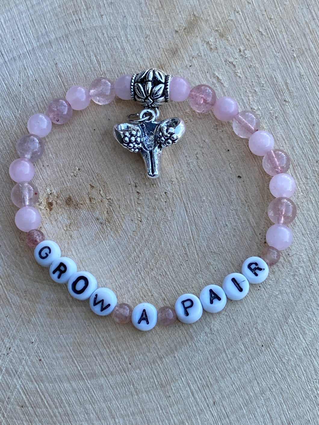 “Grow a Pair” Uterus charm Rose Quartz bracelet